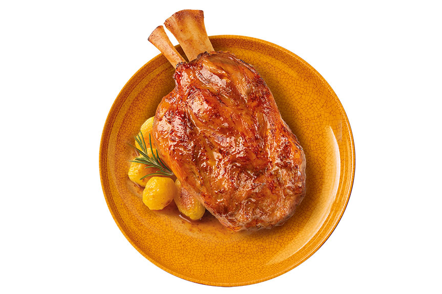 Stinco di maiale con patate sabbiose