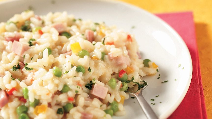 Risotto con prosciutto cotto e piselli