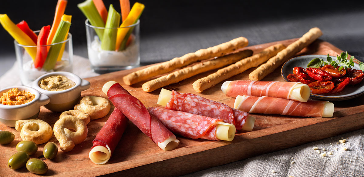 APERITIVO CON SNACK ROLLS BERETTA